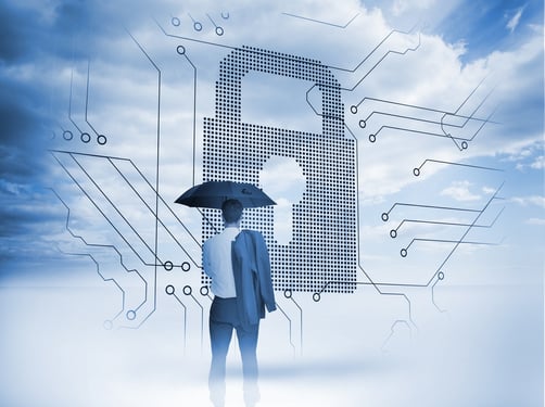 Businessman under an umbrella looking at a big padlock with circuit board and blue sky on the background.jpeg